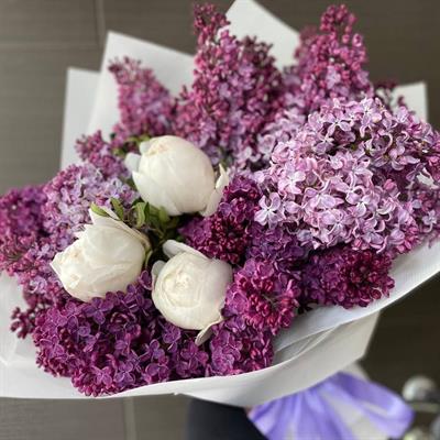 A bouquet of lilacs and peonies