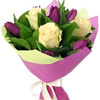 A delicate bouquet of roses and tulips A delicate bouquet of roses and tulips