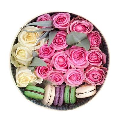 Composition with roses and macaroons Composition with roses and macaroons