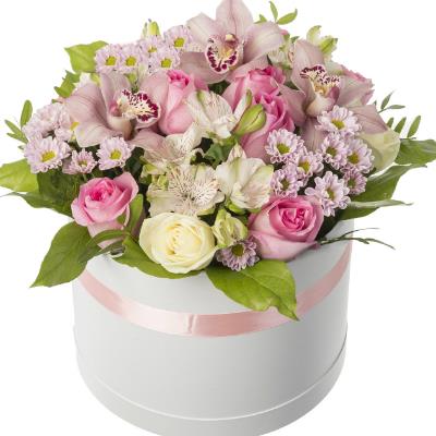 Box with roses, orchids and alstromeria Box with roses, orchids and alstromeria