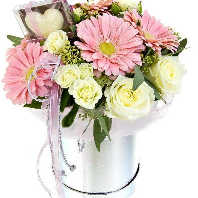 Silver box with gerberas and roses Silver box with gerberas and roses