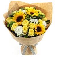 Bouquet of sunflowers and yellow roses
