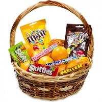 Basket with tangerines and sweets