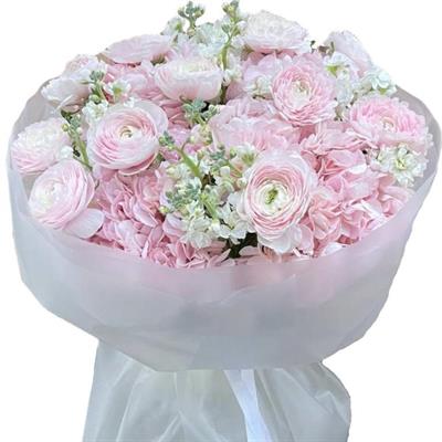 A delicate composition with ranunculus A delicate composition with ranunculus