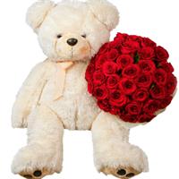 Gorgeous bouquet of roses with a big bear