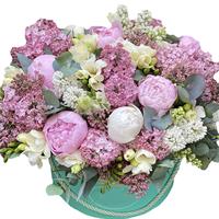 Gorgeous composition with peonies and lilacs