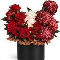 Arrangement with roses, a chrysanthemum, and a hydrangea