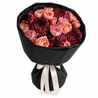 A bouquet of peony-style roses and chrysanthemums 