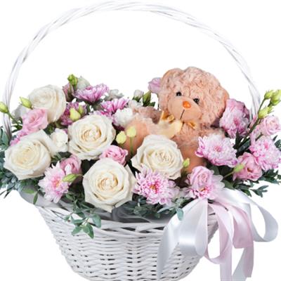 Basket with flowers and teddy bear Basket with flowers and teddy bear