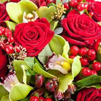 Bouquet of red roses and orchids