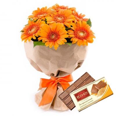 Bouquet of 7 multicolored gerberas, Milk chocolate Roshen as a gift. Bouquet of 7 multicolored gerberas, Milk chocolate Roshen as a gift.
