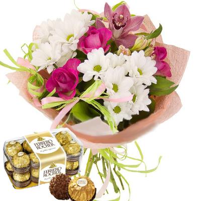 Delicate composite bouquet and Ferrero Rocher candies as a gift. Delicate composite bouquet and Ferrero Rocher candies as a gift.