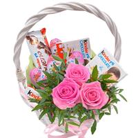Small gift basket with sweets and flowers  Small gift basket with sweets and flowers
