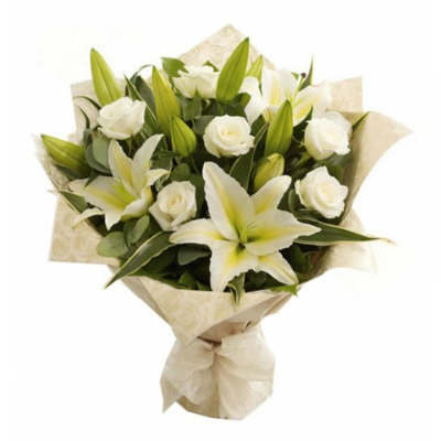 Charming bouquet of lilies and delicate roses Charming bouquet of lilies and delicate roses