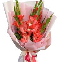 Яскравий букет з 5 коралових гладіолусів Яскравий букет з 5 коралових гладіолусів